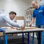 Рабочий на мебельной фабрике фото